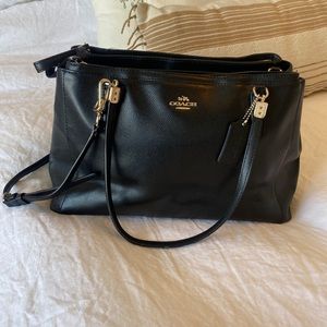 Coach tote bag, black with multiple pockets and a shoulder strap